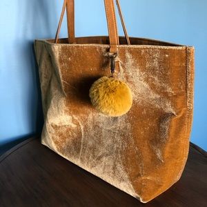 Golden velvet-feel tote with pompom charm